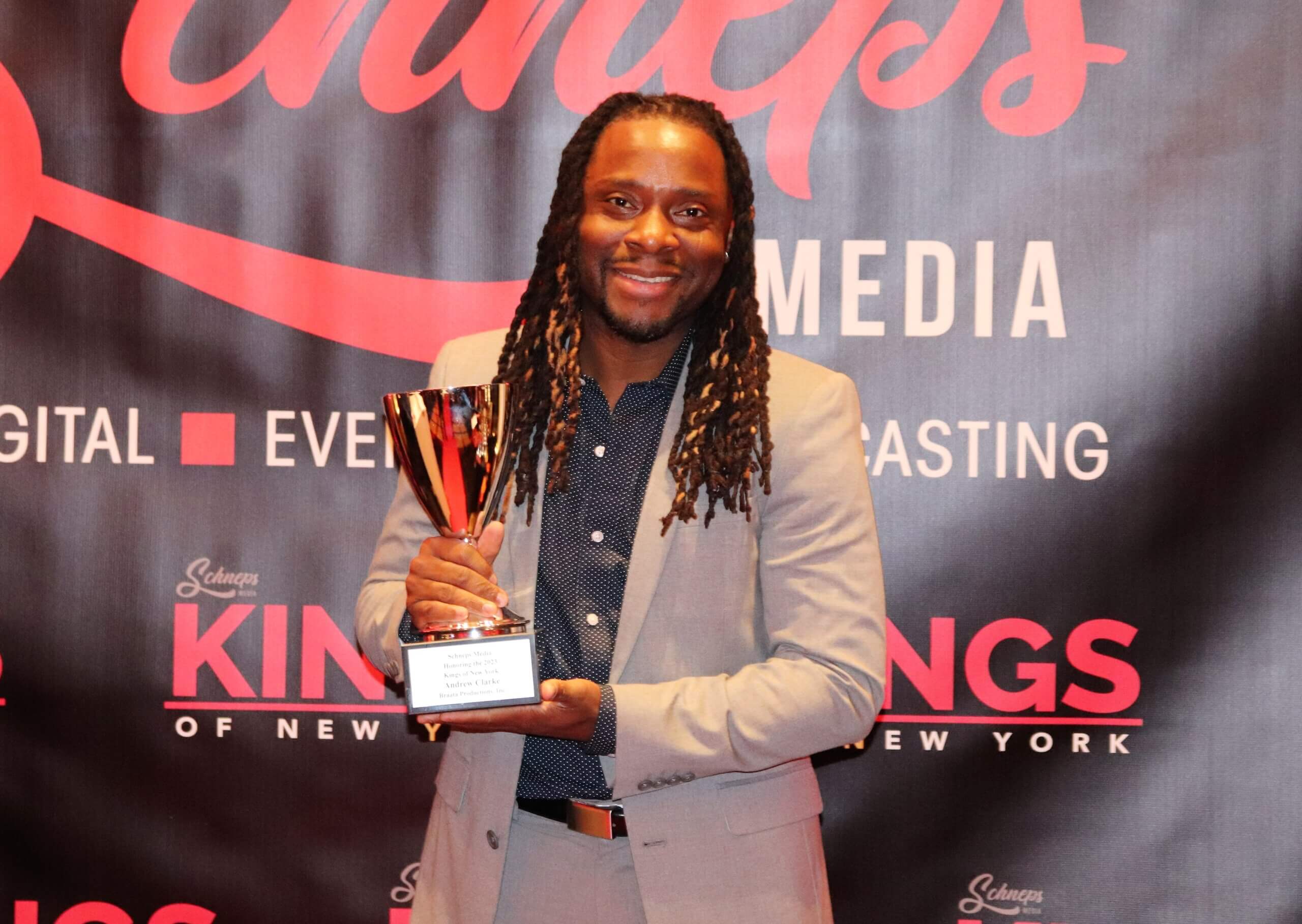 Andrew Clarke, executive director at Braata Productions with his award at the Kings of New York event  (Photo by Michael Dorgan)