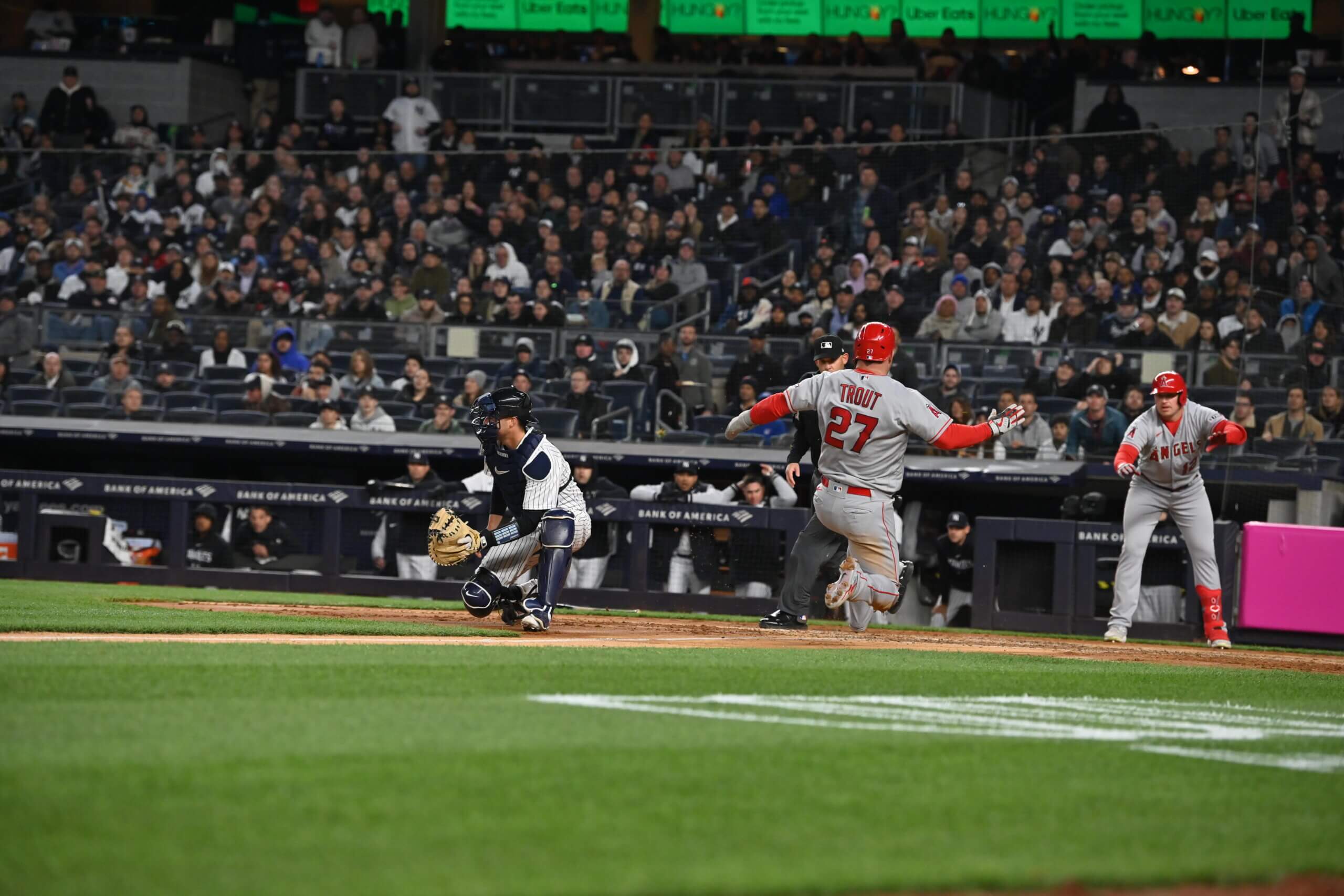 Los Angeles Angels Mike Trout slides into home in the fourth inning during a game between the Yankees and Angels on April 18, 2023.