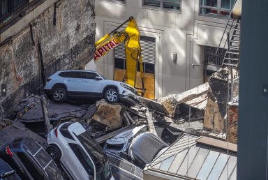 The collapsed roof of the garage at 57 Ann Street.
