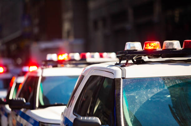 New York NYPD Police car with sirens at day on street