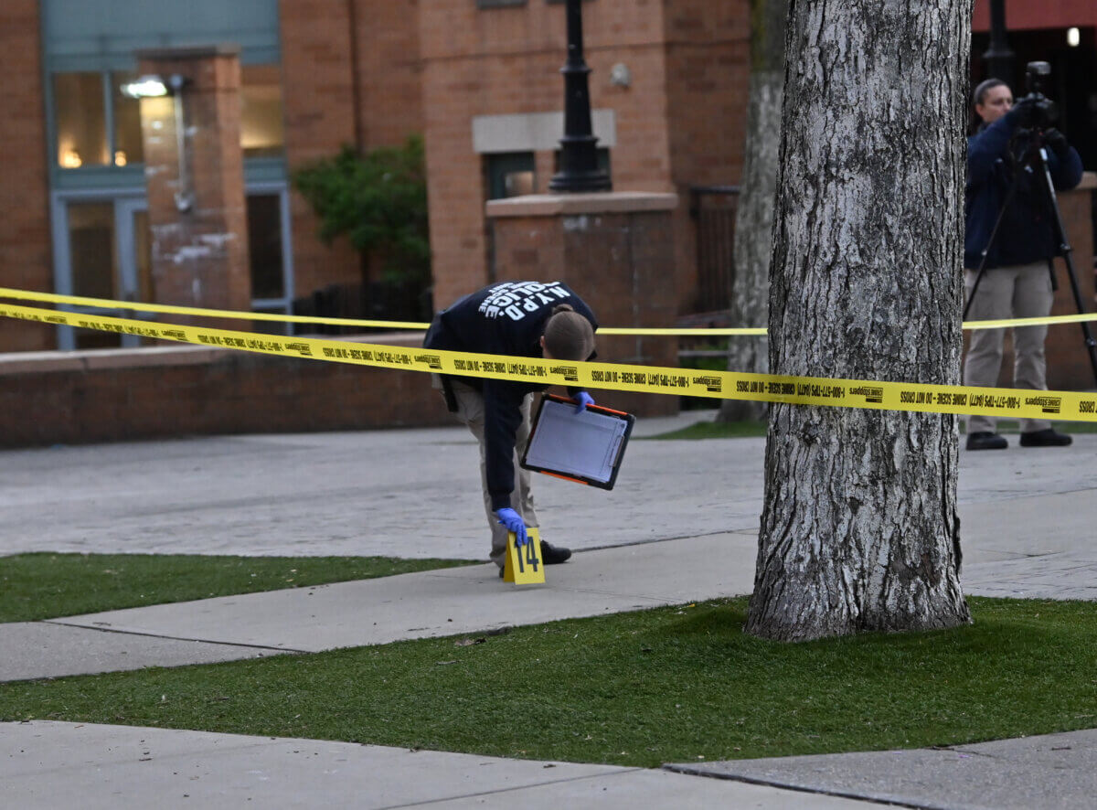 Brooklyn crime scene detective investigates shooting scene