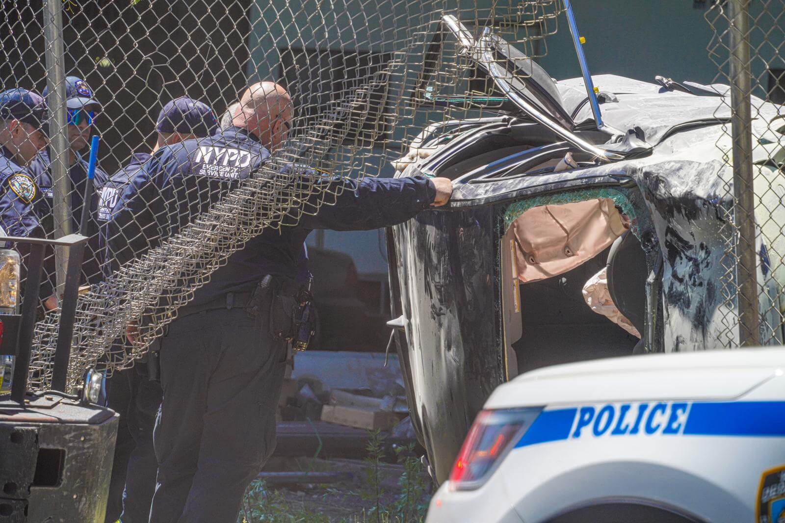 Senior man in critical condition after his vehicle careens off Henry Hudson Parkway in Manhattan: cops 4 NYPD at Accident Scene