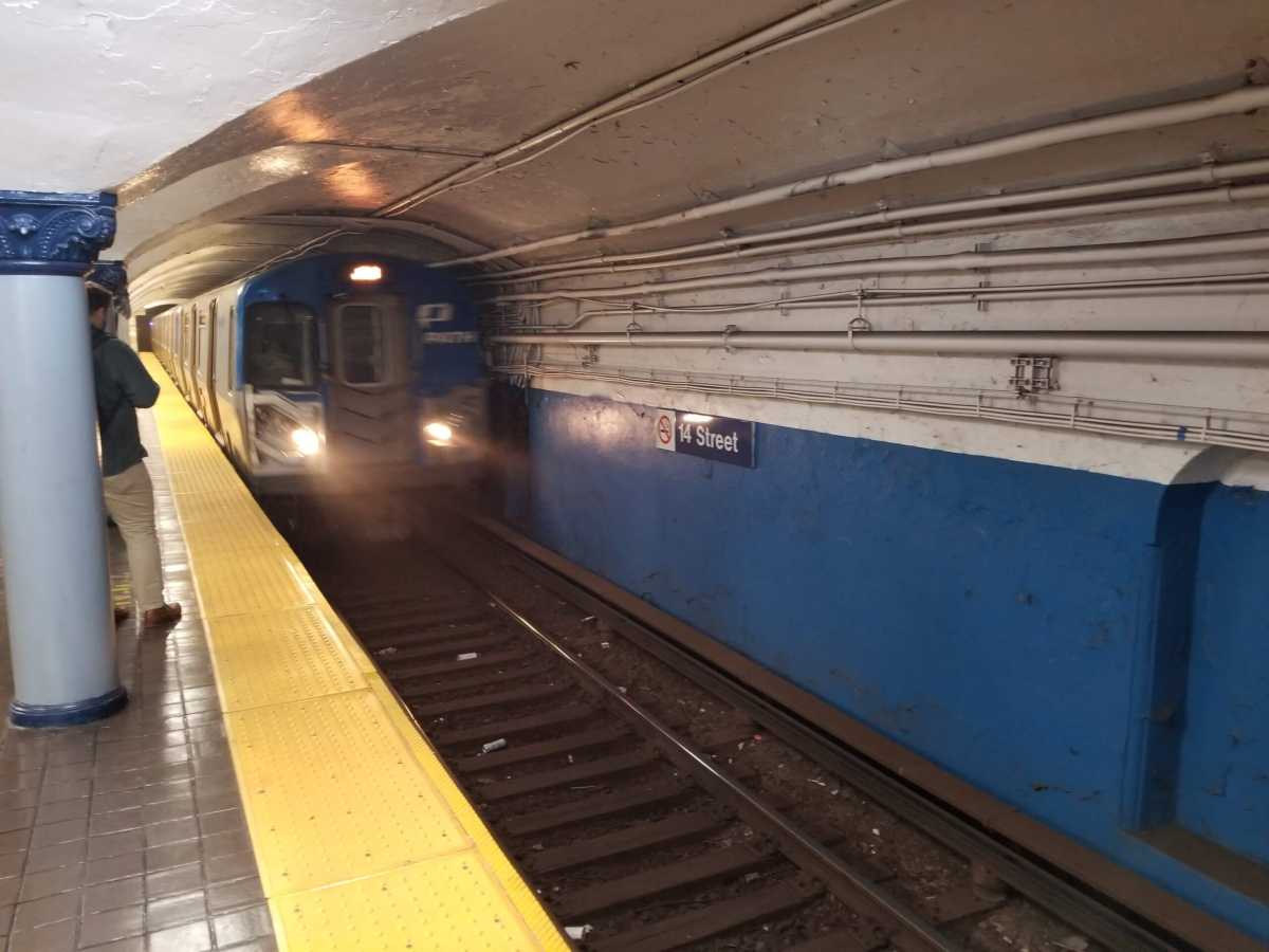 A New Jersey-bound PATH train enters 14th Street station.