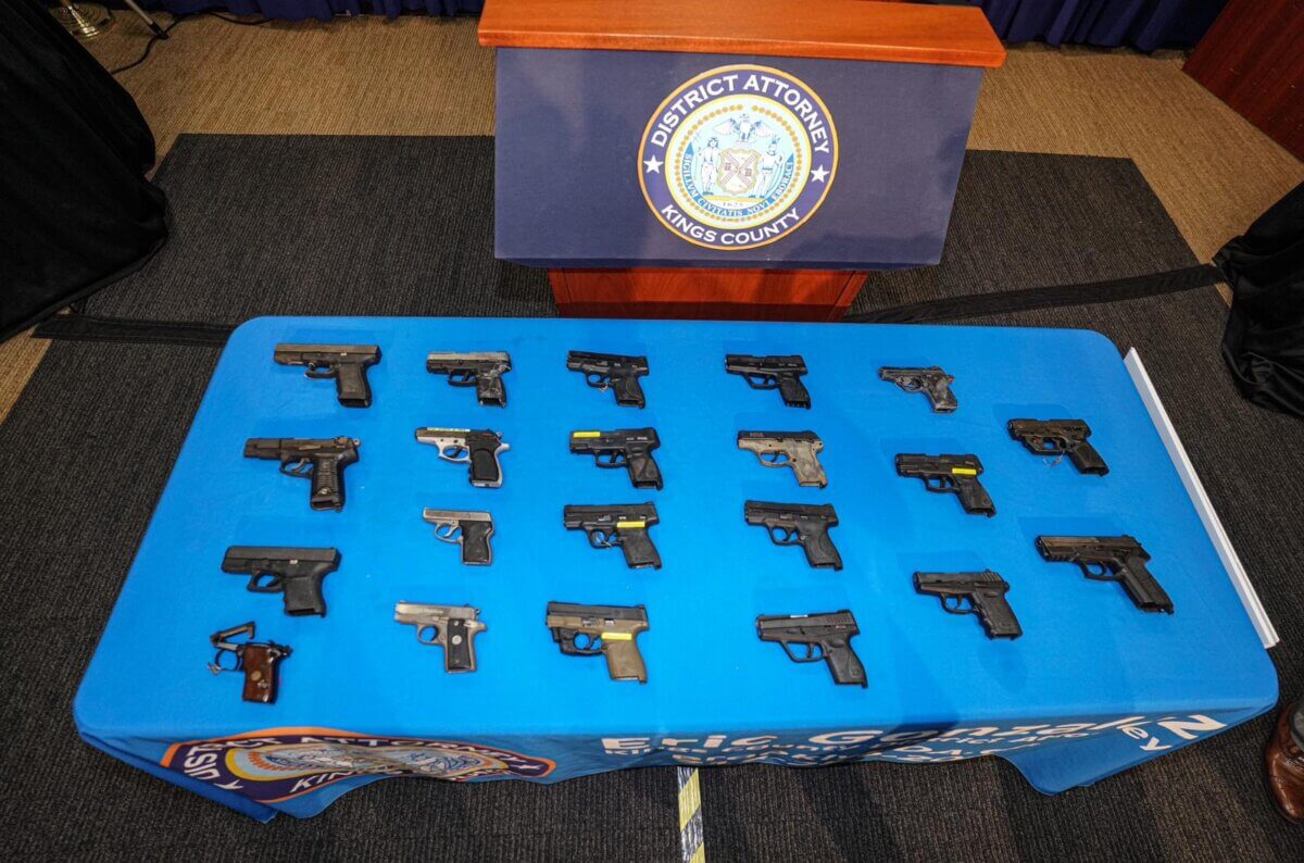 Handguns laid out on table