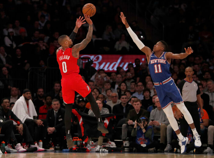 Damian Lillard shoots against the Knicks