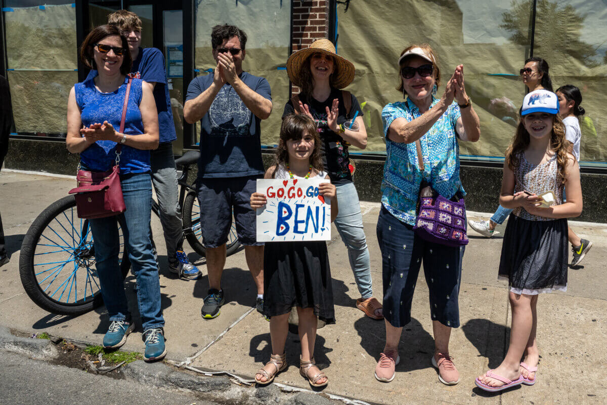 Parade revelers line Metropolitan Avenue in Forest Hills for the Memorial Day parade