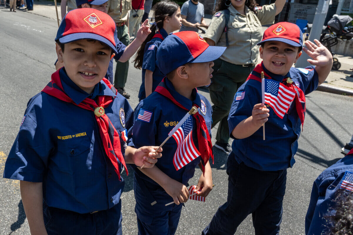 The Boy Scouts of America march in the Forest Hills Memorial Day Parade