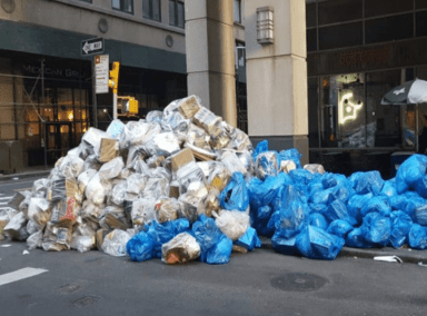 piles of trash on the street