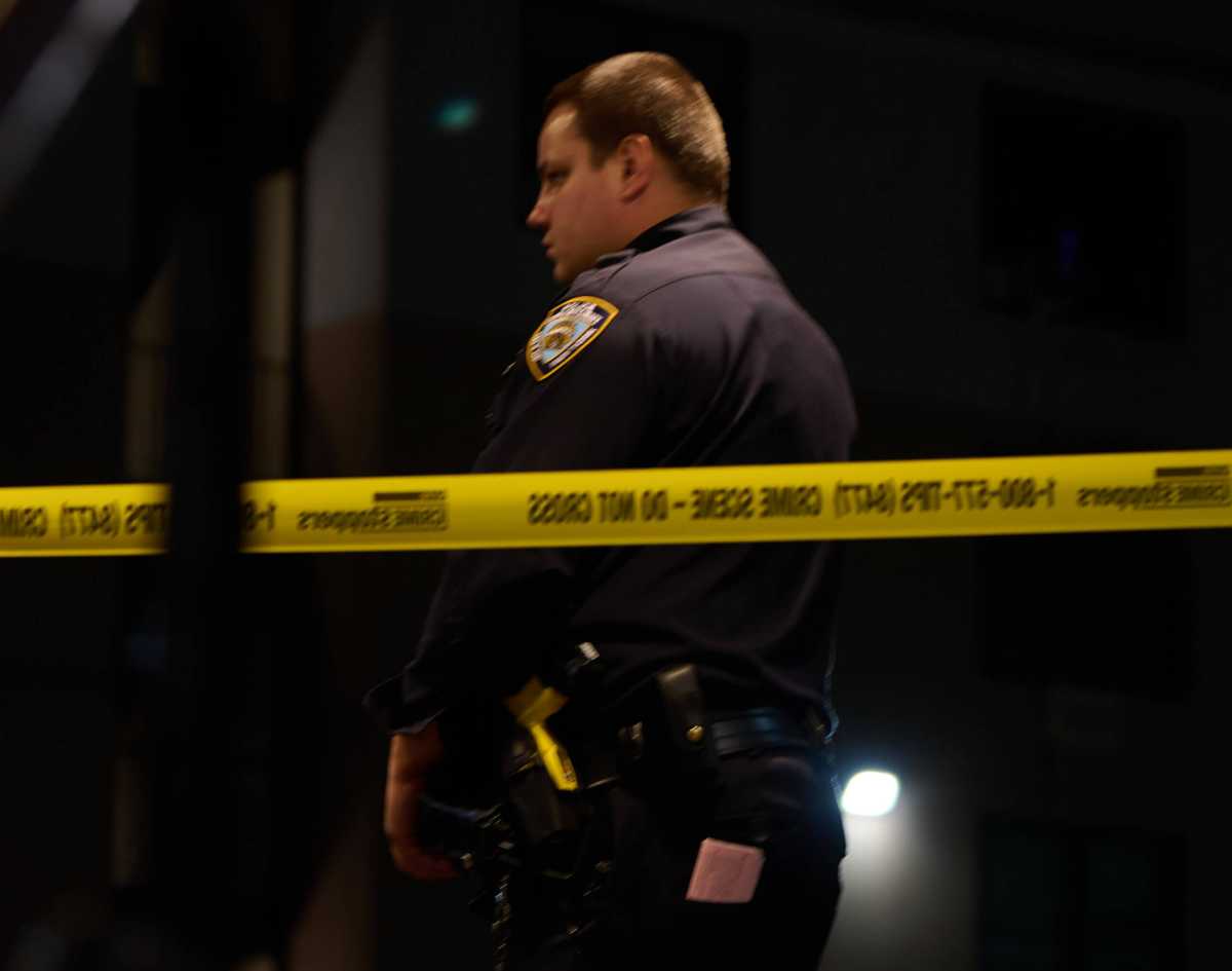 A police officer at a crime scene.
