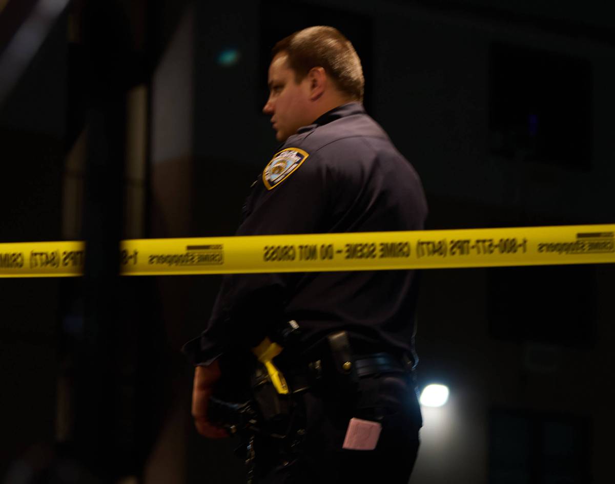 A police officer at a crime scene.