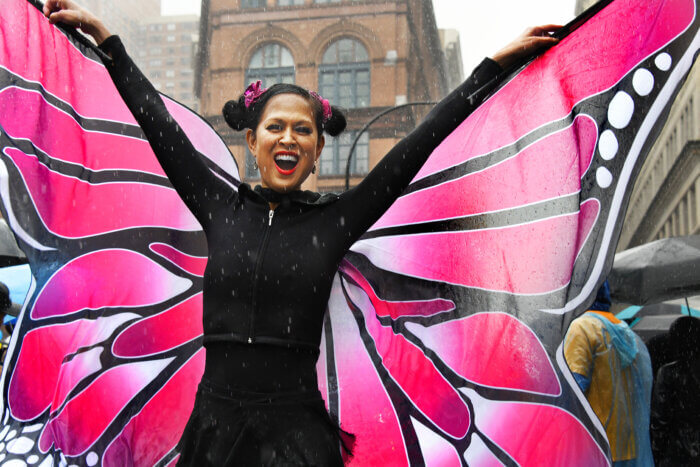 Dancer in butterfly costume at the 2023 Dance Parade