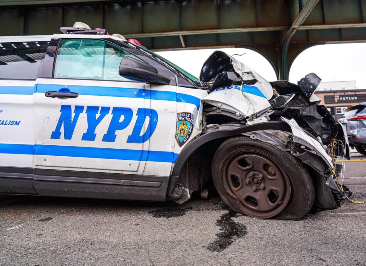 Two NYPD officers injured in Queens car collision amNewYork