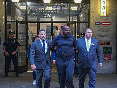 Claude White, 33, was cuffed and brought to Rikers Island for the alleged murder of 32-year-old Tavon Silver on June 20.