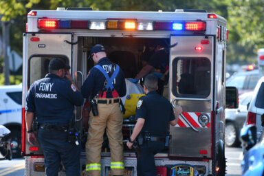 FDNY paramedics load an ambulance