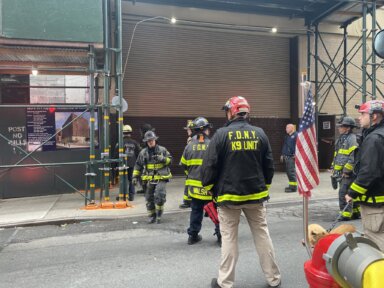 Firefighters work to rescue Lower East Side construction worker