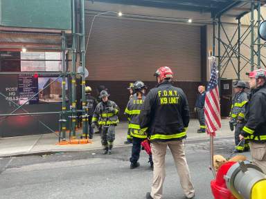 Firefighters work to rescue Lower East Side construction worker