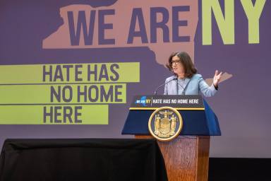 Governor Kathy Hochul signed a bill dedicating over $51 Million to non-profit organizations on college campuses to fight back against hate crimes at a a ceremony at the Museum of Jewish Heritage on July 11.
