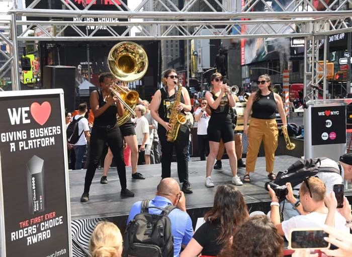 Brass Queens, New York's favorite subway performer, plays in Times Square