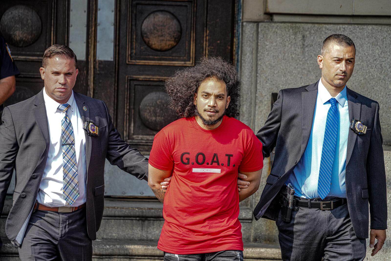 Alleged mastermind in fatal shooting of Queens boy cuffed two years after murder: cops 5 Police cuffed Ashram Lochan