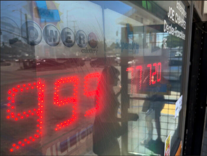 People buy Powerball tickets lottery