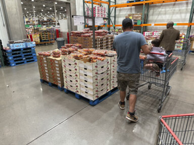 Consumer shopping for cherries at lower prices