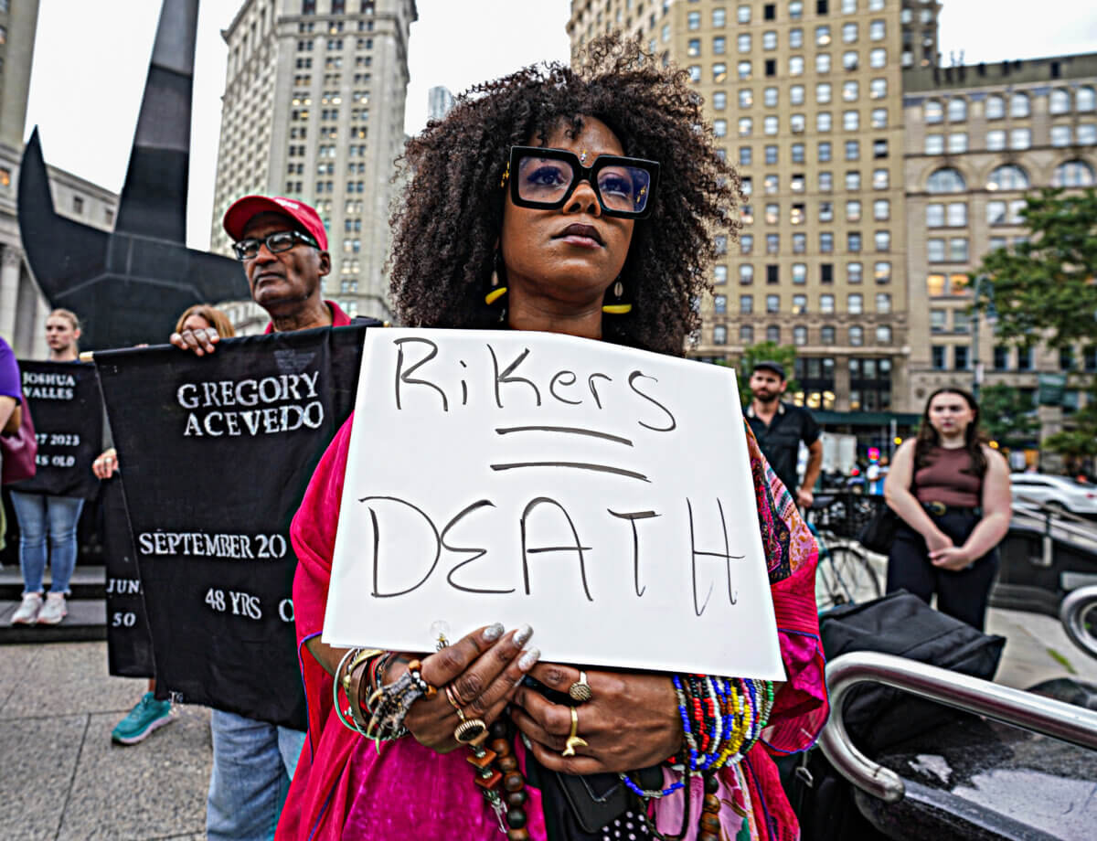 Protester demands Rikers Island closure