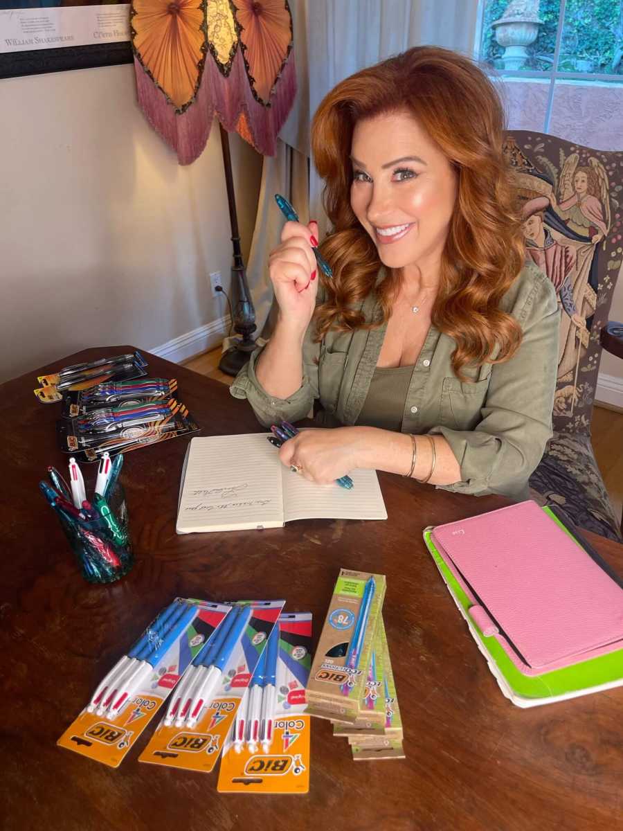 Lisa Ann Walter with school supplies