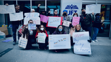 UFT rank and file members rallying for pay parity