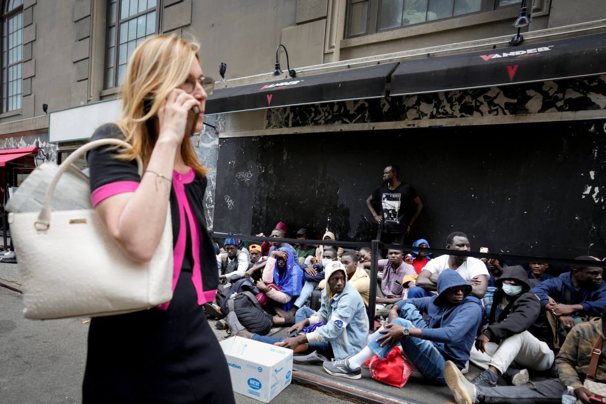 Migrants outside the Roosevelt Hotel in New York City