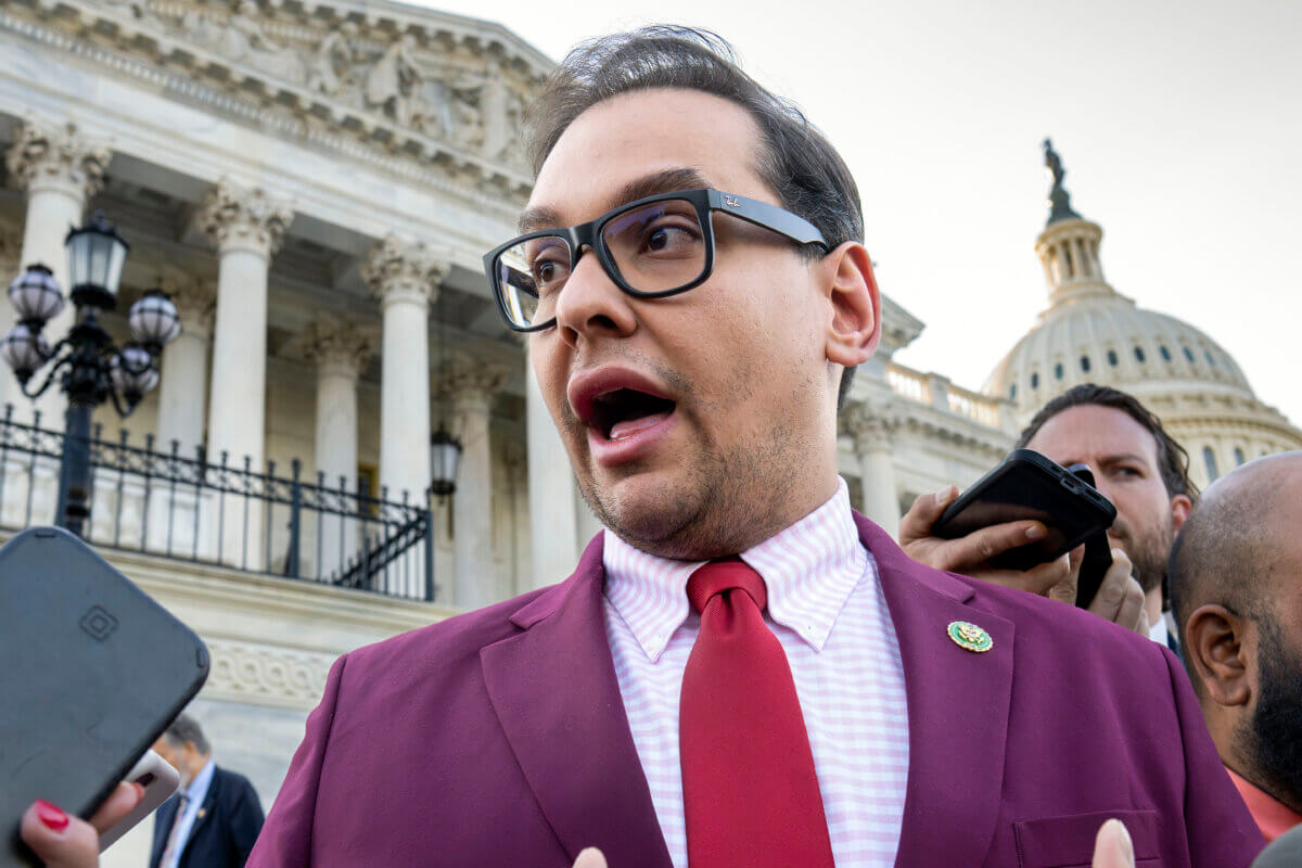 Rep. George Santos speaks to reporters outside the Capitol building on May 17, 2023.