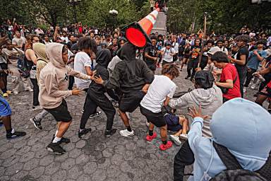 Hundreds of teenagers brawl at Union Square Friday afternoon.