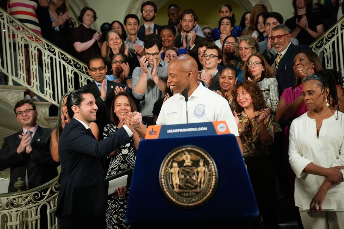 Mayor Eric Adams congratulates Fabian Levy (left) during a press conference announcing his appointment as Deputy Mayor for Communications on Monday.