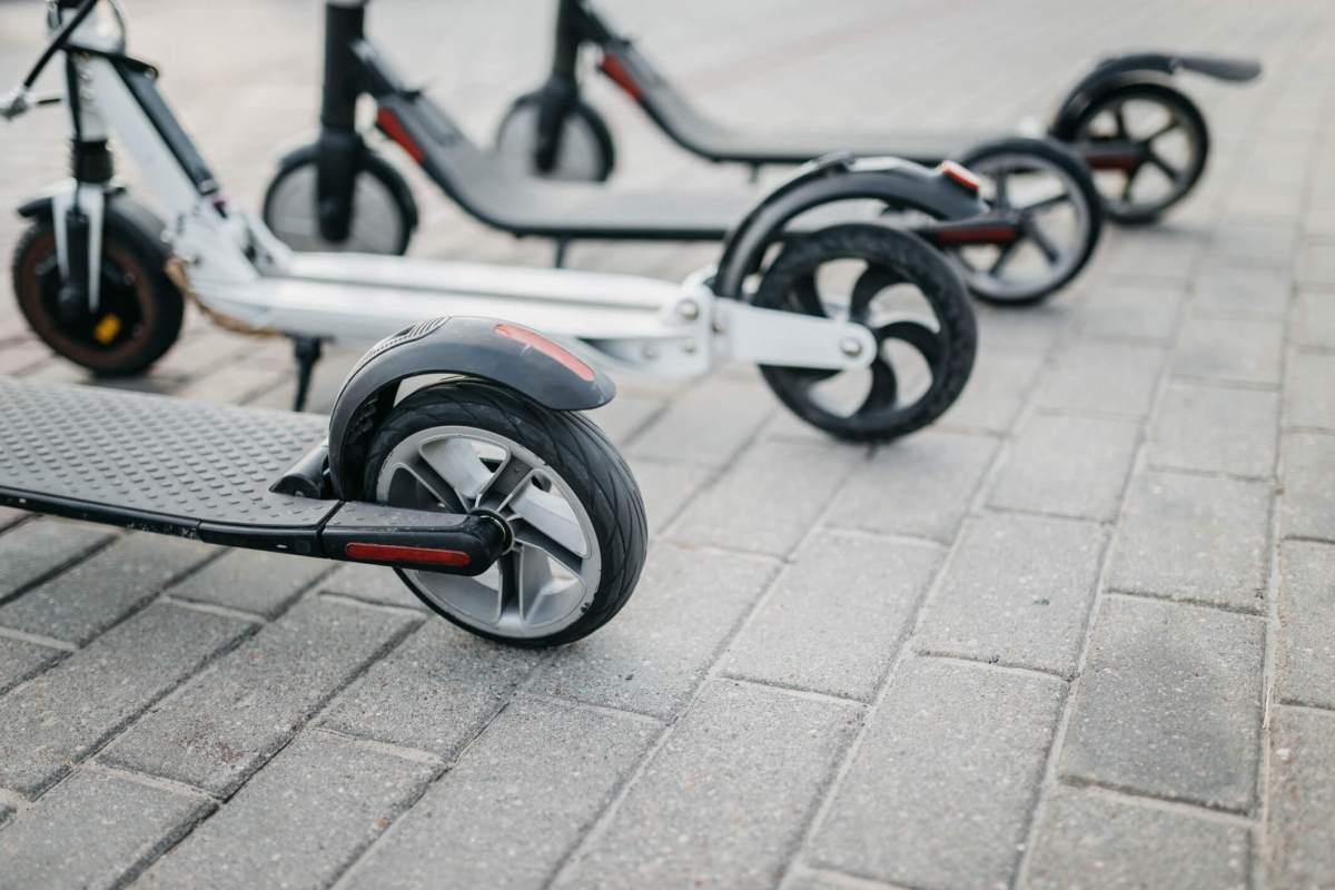 Electric scooter rental in the city. The problem of traffic jams, environmental transport in the city.