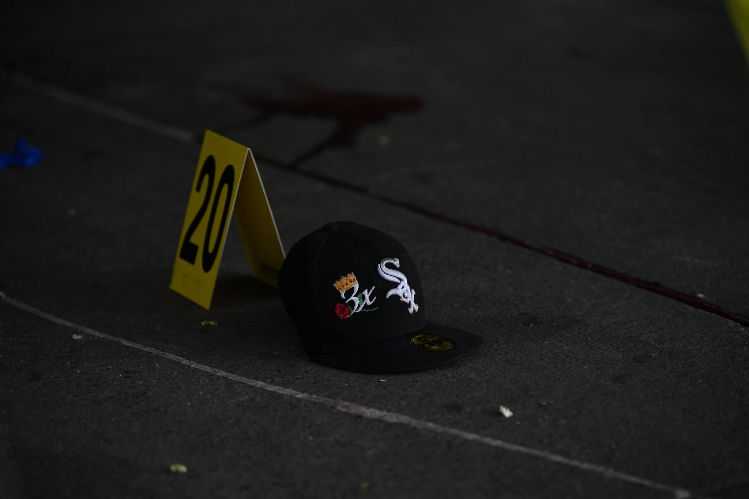 Police gather evidence at the crime scene where a man was fatally shot in Ocean Hill early Tuesday morning