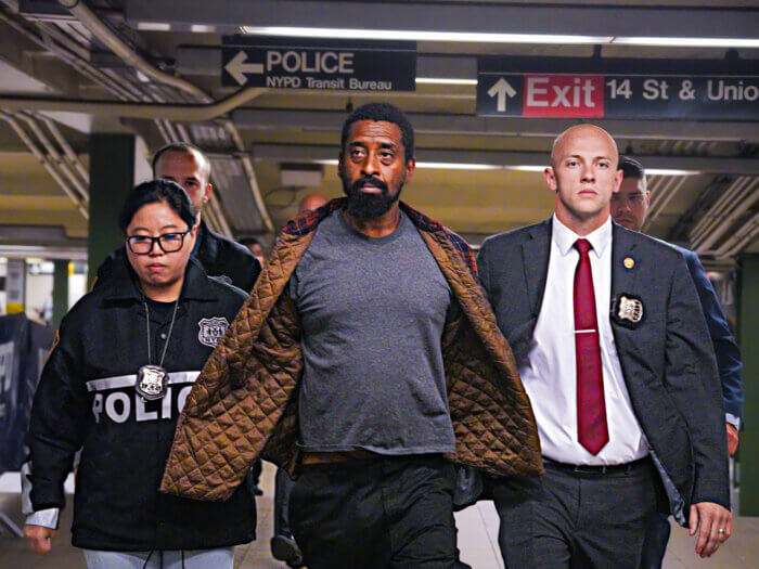 Police escort suspect in Upper East Side subway shoving
