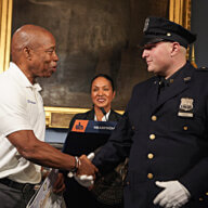 Mayor Eric Adams presented citations on Monday evening to the first responders who helped save a woman’s life after a shark attack in Queens last month.