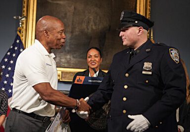 Mayor Eric Adams presented citations on Monday evening to the first responders who helped save a woman’s life after a shark attack in Queens last month.
