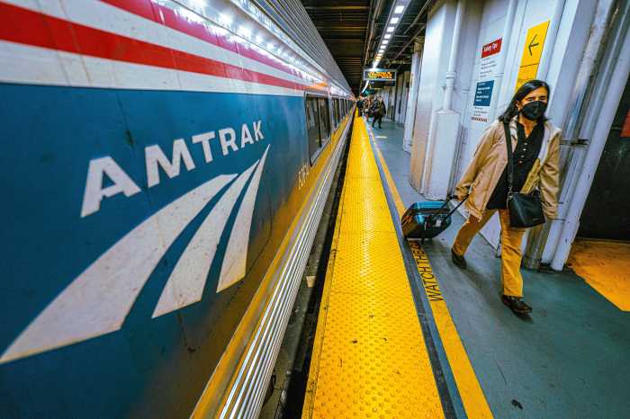 A commuter on the Amtrak platform at Penn Station.