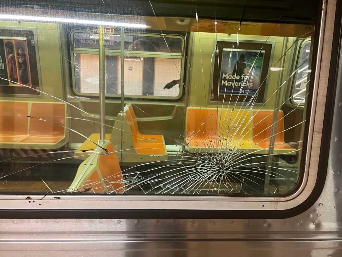 Police have arrested a 14-year-old boy in connection to a spree of vandalism against subway windows last month.