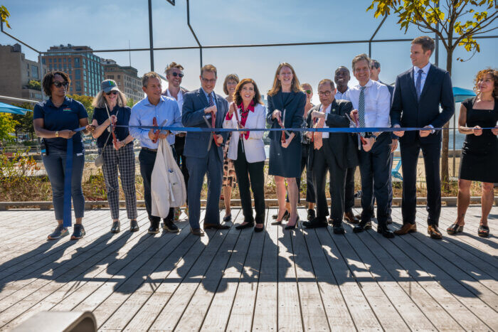 Officials cut the ribbon on the new public beach on Monday.