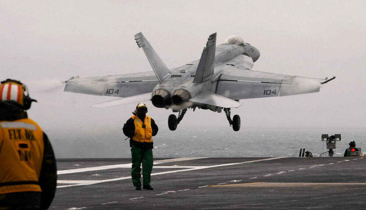 Fighter jet launches from aircraft carrier USS Gerald R Ford
