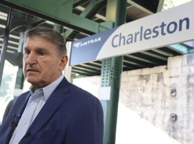 Senator Joe Manchin during press conference at train station