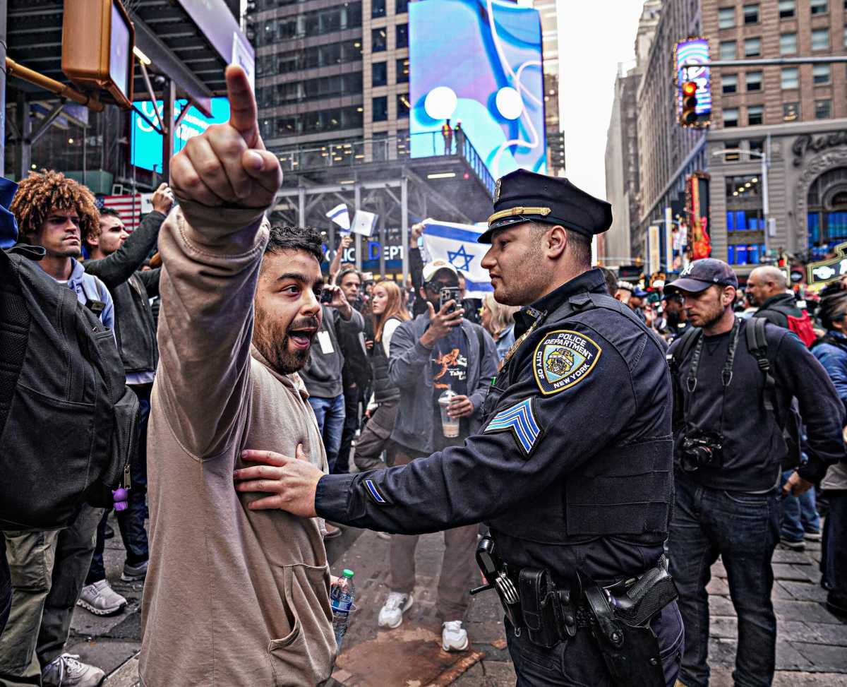 Three protesters were arrested on Sunday.