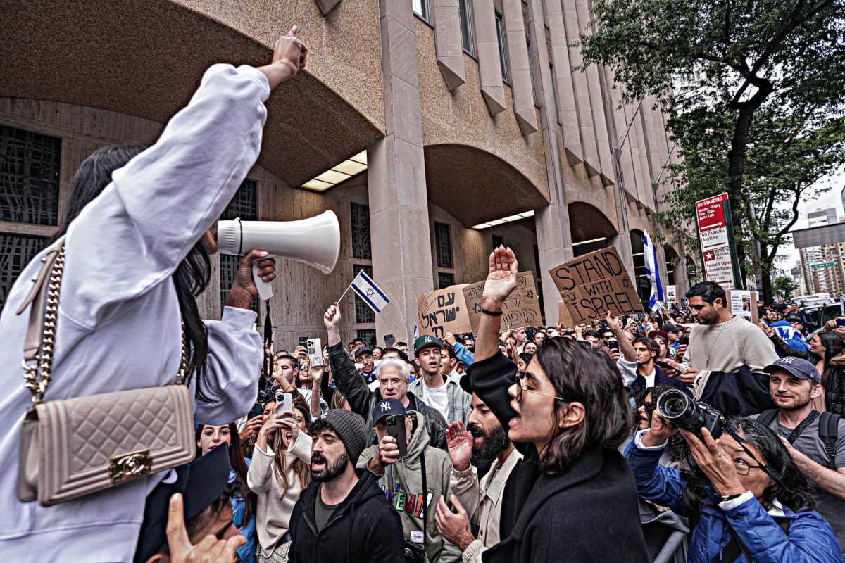 Pro-Israeli demonstrators gather in Midtwon for dueling rallies with pro-Palestinian advocates.