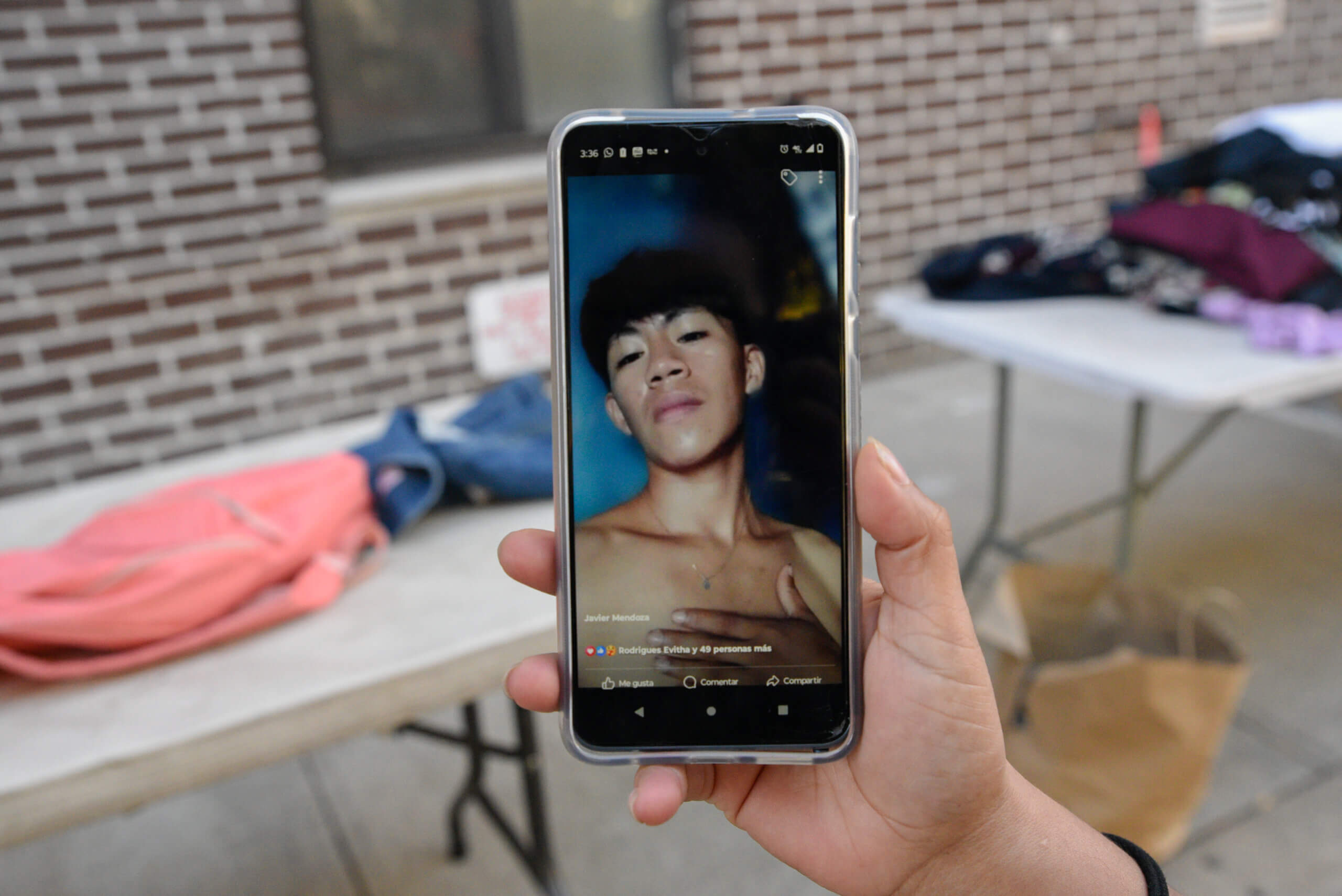 Tales of survival: Migrant mother from El Salvador forges ahead in New York while husband and son remain incarcerated at Texas border 8 Marlena Mendoza shows a photo of her son Javier, 18, who is currently being detained on the border