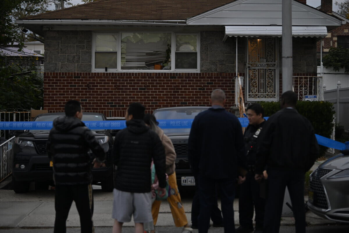 Police examine home where Queens man was shot in apparent robbery