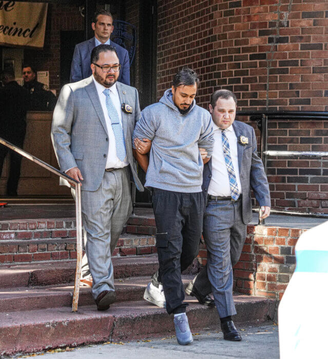Midtown hate crime suspect Christopher D'Aguiar arrested and escorted by police