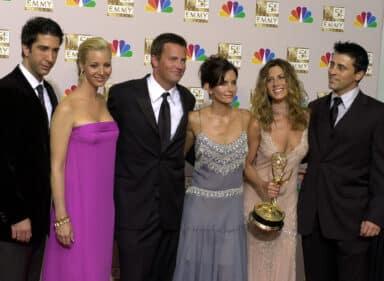 FILE - David Schwimmer, from left, Lisa Kudrow, Matthew Perry, Courteney Cox, Jennifer Aniston and Matt LeBlanc pose after "Friends" won outstanding comedy series at the 54th Primetime Emmy Awards on Sept. 22, 2002, in Los Angeles.