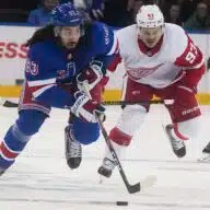 Rangers rally over Red Wings