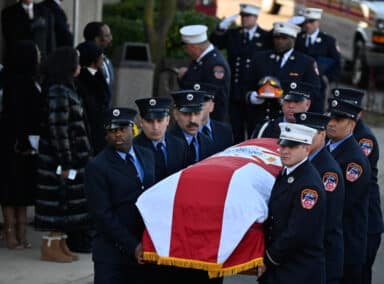 Paulbears carry the casket of fallen EMT Frederick Whiteside.